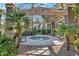 Outdoor community hot tub area, surrounded by lush landscaping and shaded seating at 4465 E Paradise Village S Pkwy # 1200, Phoenix, AZ 85032