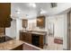 Functional kitchen featuring granite countertops, wood cabinets, and ample counter space at 6035 N 9Th Ave, Phoenix, AZ 85013