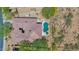 Aerial view highlighting the home's private pool and outdoor living spaces amidst the natural desert landscape at 7283 E Brisa Dr, Scottsdale, AZ 85266