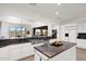Open concept kitchen with stainless steel appliances, granite countertops, and island at 7283 E Brisa Dr, Scottsdale, AZ 85266