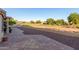 Backyard patio with expansive views of the community, golf course, and desert vegetation at 8061 E Lavender Dr, Gold Canyon, AZ 85118