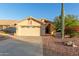 Charming single-Gathering home featuring a two-car garage, desert landscaping, and mature Saguaro cactus at 8061 E Lavender Dr, Gold Canyon, AZ 85118