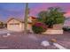 Charming single-Gathering home featuring a two-car garage, desert landscaping, and mature Saguaro cactus at 8061 E Lavender Dr, Gold Canyon, AZ 85118