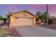 Charming single-Gathering home featuring a two-car garage, desert landscaping, and mature Saguaro cactus at 8061 E Lavender Dr, Gold Canyon, AZ 85118