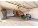 Spacious garage equipped with storage, a golf cart and room for vehicles at 8061 E Lavender Dr, Gold Canyon, AZ 85118
