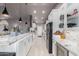 Spacious kitchen showcasing granite countertops, stainless steel appliances, and sleek pendant lighting at 8061 E Lavender Dr, Gold Canyon, AZ 85118