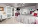 Comfortable main bedroom showcasing access to the bathroom, and a desk area at 8061 E Lavender Dr, Gold Canyon, AZ 85118