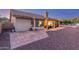 The home's backyard boasts a covered patio and ample room for outdoor activities at 8061 E Lavender Dr, Gold Canyon, AZ 85118
