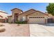 Charming single-story home featuring desert landscaping and a two-car garage at 8343 W Paradise Dr, Peoria, AZ 85345