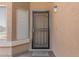 Close up shot of the front door with security gate at 8343 W Paradise Dr, Peoria, AZ 85345