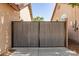 Sturdy, modern gate in driveway enhancing the curb appeal and security of the property at 8343 W Paradise Dr, Peoria, AZ 85345