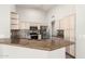 Modern kitchen with granite counters and stainless steel appliances at 8343 W Paradise Dr, Peoria, AZ 85345