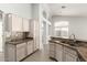 Well-appointed kitchen with ample cabinet space and breakfast bar area at 8343 W Paradise Dr, Peoria, AZ 85345