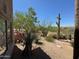 Beautiful desert backyard with mature trees and landscaping at 8880 E Paraiso Dr # 120, Scottsdale, AZ 85255