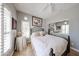 Light filled bedroom featuring shutters and comfortable bedding at 8880 E Paraiso Dr # 120, Scottsdale, AZ 85255