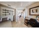Neutral bedroom featuring view into the main living area with ceiling fan at 8880 E Paraiso Dr # 120, Scottsdale, AZ 85255