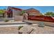 Exterior view of John R. Dobson Administration Center with desert landscaping at 10124 E Michigan Ave, Sun Lakes, AZ 85248