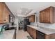 Well-equipped kitchen featuring granite countertops, modern appliances, and plenty of cabinet space at 10124 E Michigan Ave, Sun Lakes, AZ 85248