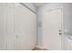 Convenient laundry room featuring side by side washer and dryer and closet storage at 10124 E Michigan Ave, Sun Lakes, AZ 85248
