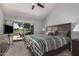 Serene main bedroom with private patio access, ceiling fan and views of the yard at 10124 E Michigan Ave, Sun Lakes, AZ 85248