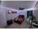 Cozy bedroom with carpet, a ceiling fan, and festive lighting has a cheerful ambiance at 10347 W Odeum Ln, Tolleson, AZ 85353