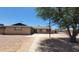 Charming single-story brick home with a basketball hoop, mature landscaping, and a spacious driveway at 1103 E Palmcroft Dr, Tempe, AZ 85282