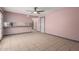 Spacious living room featuring tile flooring, neutral walls, and ample natural light at 1123 W Mendoza Ave, Mesa, AZ 85210
