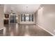 Open-concept dining room features tile floors, neutral walls, recessed lighting, and access to the backyard at 11352 E Dartmouth St, Mesa, AZ 85207