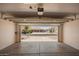Spacious garage, offering a glimpse of the well-maintained neighborhood and ample driveway at 11352 E Dartmouth St, Mesa, AZ 85207