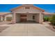 Attached garage featuring built-in cabinets for organized storage and a clean, spacious interior at 11352 E Dartmouth St, Mesa, AZ 85207