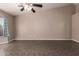Inviting living space featuring a ceiling fan and neutral tones, great for flexible furniture arrangements at 11352 E Dartmouth St, Mesa, AZ 85207