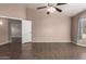 Comfortable main bedroom featuring ample natural light and tile flooring, providing a versatile space at 11352 E Dartmouth St, Mesa, AZ 85207