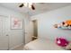 Comfortable bedroom featuring a ceiling fan, closet, and window for natural light at 1397 E Laurel Pl, Casa Grande, AZ 85122