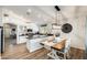 Eat-in kitchen with stainless appliances, lots of counter space, and open access to living spaces at 1397 E Laurel Pl, Casa Grande, AZ 85122
