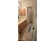 Bathroom features vanity with sink and mirror with view to closet at 14214 N Galatea Dr # A, Fountain Hills, AZ 85268