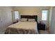 Comfortable bedroom features neutral tones, two windows, and closet at 14214 N Galatea Dr # A, Fountain Hills, AZ 85268