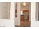 Open kitchen featuring wood cabinets, laminate countertops, white appliances, and tile floors at 14214 N Galatea Dr # A, Fountain Hills, AZ 85268