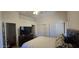 Main bedroom with ceiling fan, TV, and closet; a cozy retreat at 14214 N Galatea Dr # A, Fountain Hills, AZ 85268
