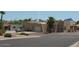 Beautiful community with well-maintained landscaping, palm trees, and neighborhood fountain at 14214 N Galatea Dr # A, Fountain Hills, AZ 85268