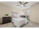 Relaxing bedroom featuring a ceiling fan, a modern desk, and neutral tones at 154 W 5Th St # 246, Tempe, AZ 85281
