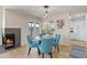 Cozy dining area featuring modern lighting, a patio view, and seating for four at 154 W 5Th St # 246, Tempe, AZ 85281