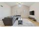Bright living room featuring vaulted ceilings, clerestory window and a large comfy sectional sofa at 154 W 5Th St # 246, Tempe, AZ 85281