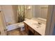 Bathroom featuring a shower-tub combo, a toilet, and vanity with sink at 17458 N 64Th Dr, Glendale, AZ 85308