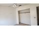 Bedroom featuring a closet and ceiling fan at 17458 N 64Th Dr, Glendale, AZ 85308