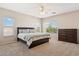 Inviting main bedroom showcasing great natural light, a fan, and a cozy sleeping space at 1753 N St Francis Pl, Casa Grande, AZ 85122