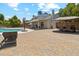 This house boasts a beautiful brick patio, refreshing pool, and lots of space for entertaining at 18819 N 49Th Ave, Glendale, AZ 85308