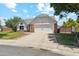 Beautifully maintained home with a well-kept lawn and two car garage in a residential neighborhood at 18819 N 49Th Ave, Glendale, AZ 85308