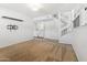 Spacious living room with carpet, stair access, TV mount, and a convenient laundry area nearby at 18819 N 49Th Ave, Glendale, AZ 85308