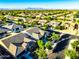 Expansive aerial view of a community with desert vegetation and low-maintenance yards at 19598 E Walnut Rd, Queen Creek, AZ 85142
