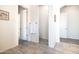 Clean bathroom features tile flooring, neutral paint, and leads to the walk-in closet at 19598 E Walnut Rd, Queen Creek, AZ 85142